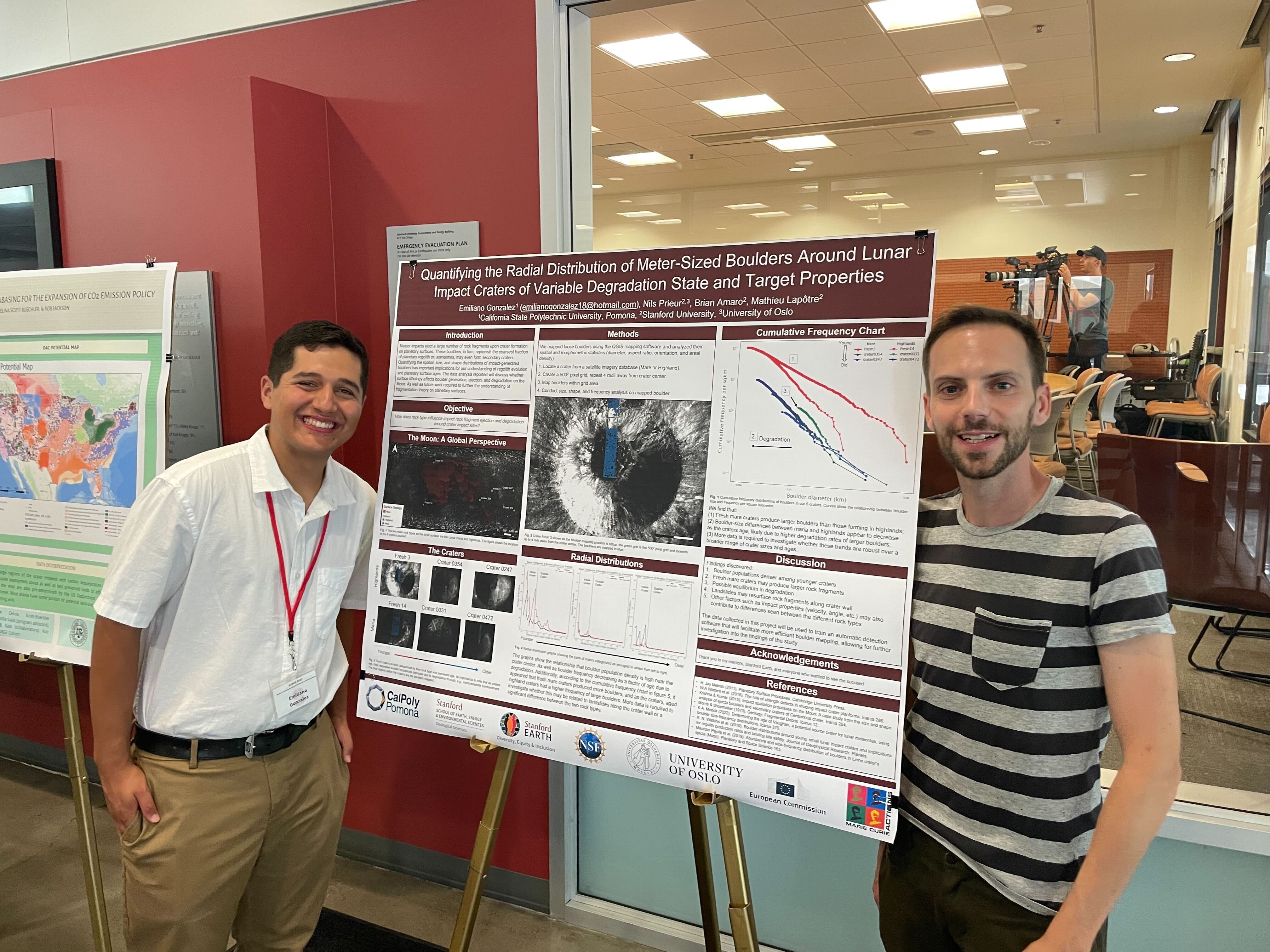 Emiliano presenting his poster